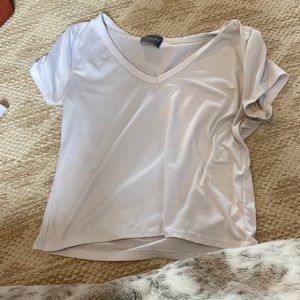 White vneck, slightly cropped